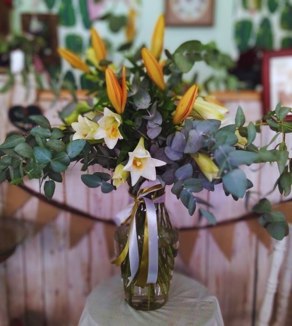 Orange Lilies in Glass Vase